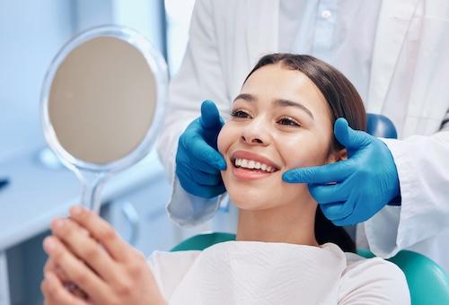 Kauai woman smiling after getting dental veneers