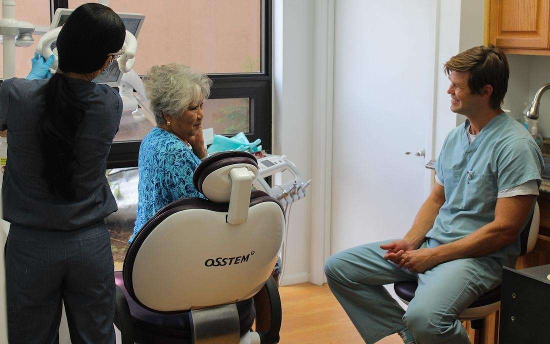 Dr. Chris Godla consulting with a lihue patient
